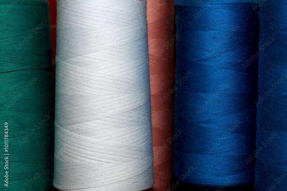 and blue and vnit stash of spools of thread next to each other.
and blue and vnit stash of spools of thread next to each other.