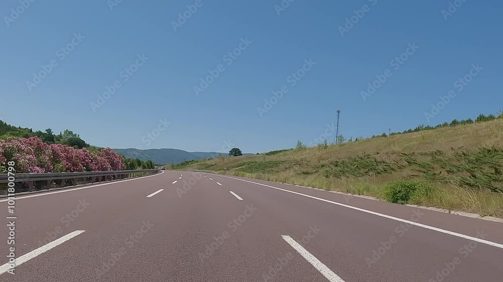 highway road in the countryside, roadside and asphalt, mountains, green forest and blue sky highway road in the countryside, roadside and asphalt, mountains, green forest and blue sky