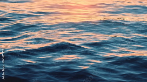 Serene Water Surface at Sunset with Gentle Ripples