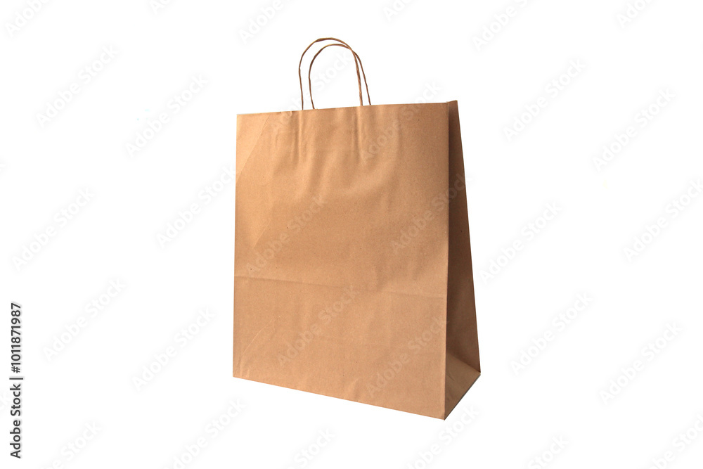 Brown kraft paper shopping bag isolated on white background. Eco-friendly recyclable packaging for retail stores, shopping related design. Brown kraft paper shopping bag isolated on white background. Eco-friendly recyclable packaging for retail stores, shopping related design.