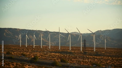 Wind Turbines renewable energy below mountains