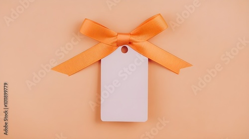 Gift Tag with Orange Bow on Peach Background Blank Label for Branding Craft and Design