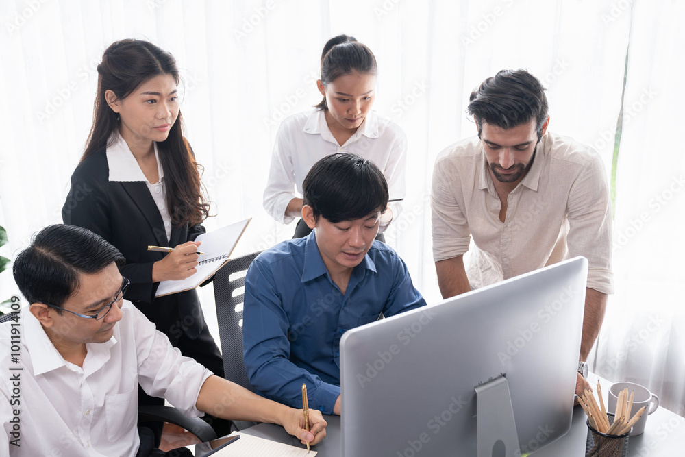 Group of diverse office worker employee working together on strategic business marketing planning in corporate office room. Positive teamwork in business workplace concept. Prudent Group of diverse office worker employee working together on strategic business marketing planning in corporate office room. Positive teamwork in business workplace concept. Prudent
