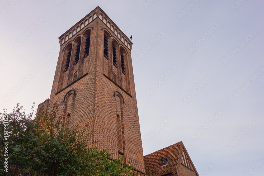 Red brick tower of Sankt Laurentii Church (Sankt Laurentii Kirke) in Roskilde