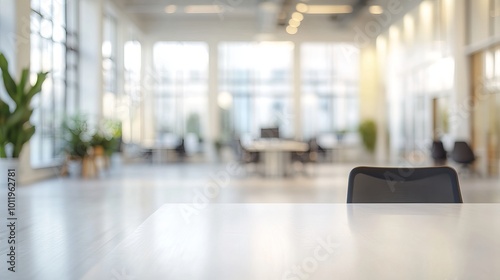 A spacious, white office interior with a blurred focus, suitable as a background image. 