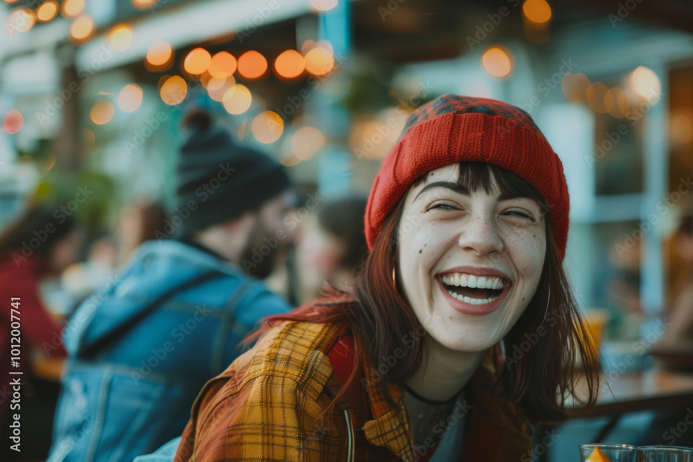 A woman wearing a red hat and smiling A woman wearing a red hat and smiling
