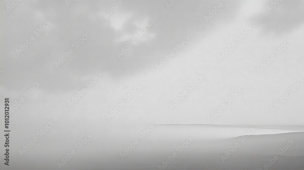 A soft white cloud pattern drapes the horizon enhancing the peacefulness of the landscape A soft white cloud pattern drapes the horizon enhancing the peacefulness of the landscape