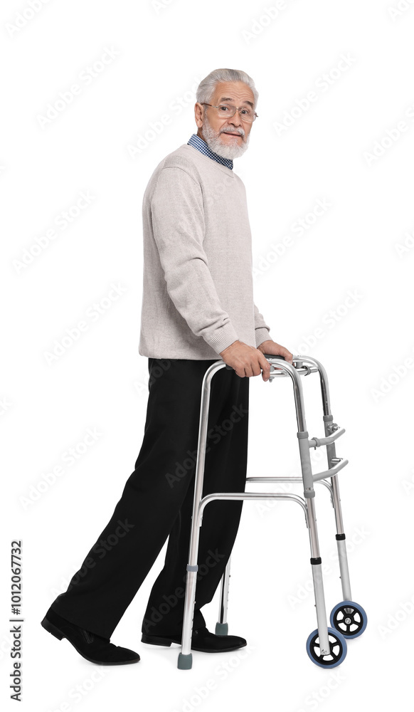 Senior man using walking frame on white background