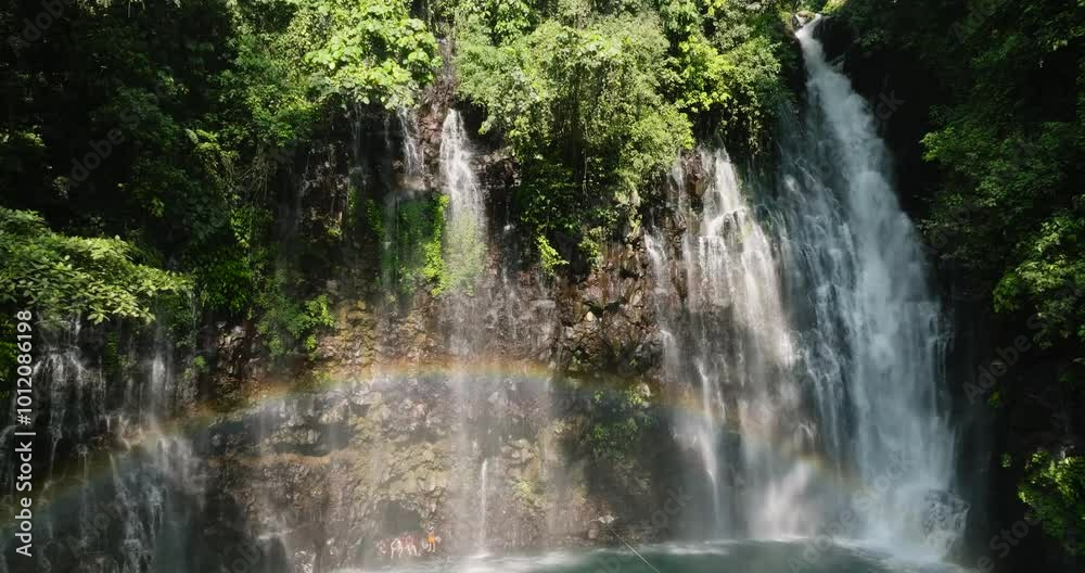 Top view of Tinago Falls with rainbow. Iligan City. Lanao del Norte. Mindanao, Philippines. Top view of Tinago Falls with rainbow. Iligan City. Lanao del Norte. Mindanao, Philippines.