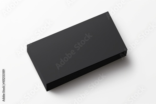 Top View of a Stack of Black Blank Business Cards on White Background: Ideal for Design Mockups and Templates with White Paper Texture photo