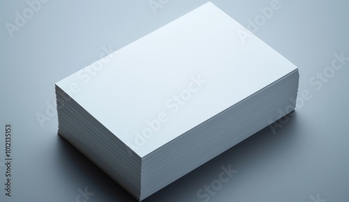 Stack of Blank Business Cards on Grey Background: High-Resolution Mockup Template with White Paper for Text or Photo, Ideal for Professional Presentations

 photo