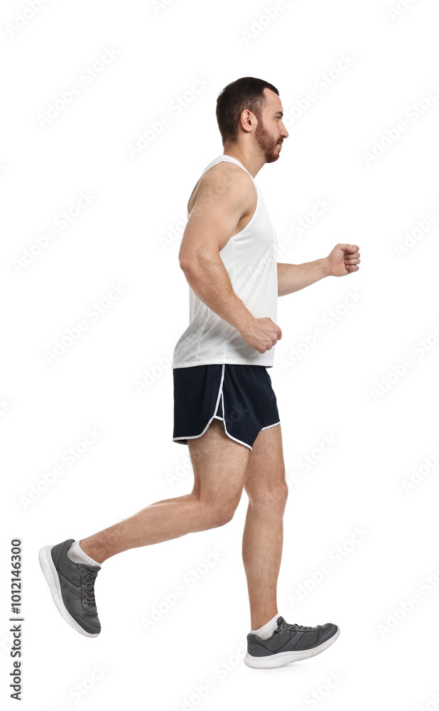 Handsome young man running on white background Handsome young man running on white background