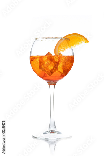 Aperol Spritz cocktail in glass with orange slice, sugar crumbs and ice cubes isolated on white background, copy space. Aperitivo