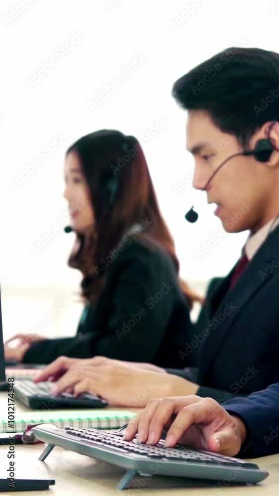 Business people wearing headset working in office to support remote customer or colleague. Call center, telemarketing, customer support agent provide service on telephone video conference call. Business people wearing headset working in office to support remote customer or colleague. Call center, telemarketing, customer support agent provide service on telephone video conference call.