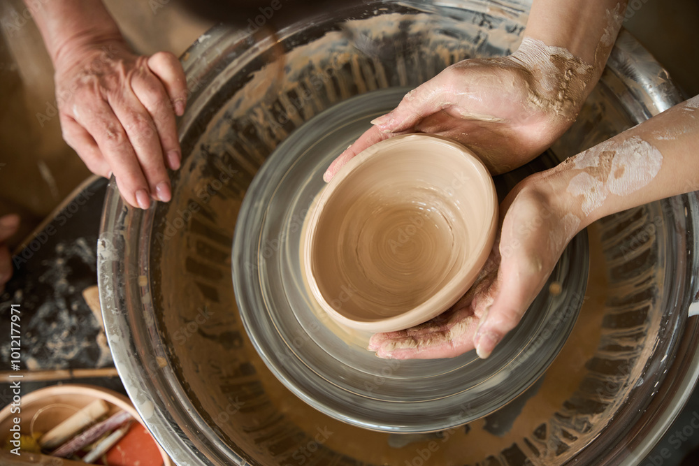 Fototapeta premium Popular pottery lesson in ceramics studio