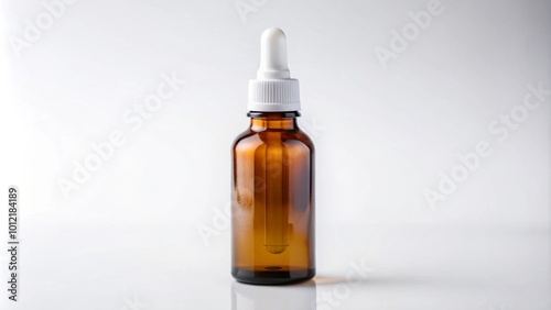 White blank labeled amber dropper bottle on an isolated background Macro