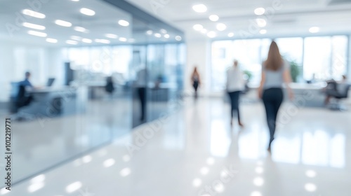 Blurred Office Interior with People Walking