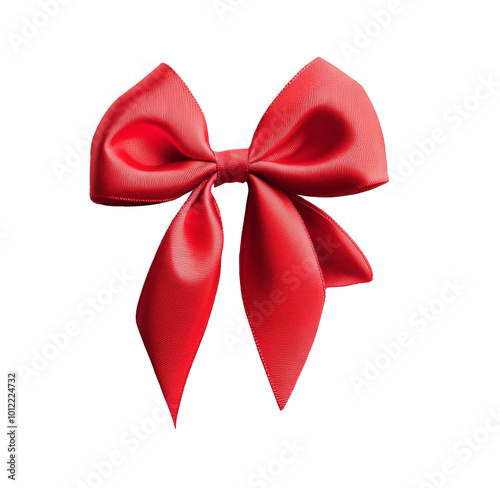 Bright red ribbon bow placed elegantly on a white surface for gift decorating