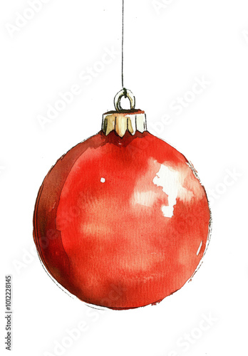 Bright red Christmas ornament hanging delicately against a light background