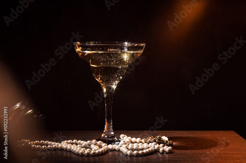 glass of champagne on a dark background.