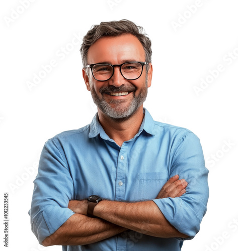 A smiling middle-aged man with glasses wears a blue shirt, arms crossed in a ...