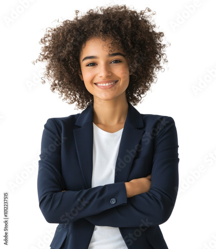 Confident businesswoman in a formal suit standing with arms crossed against a...