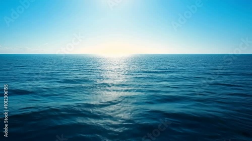 Wallpaper Mural The sun shines brightly on the calm ocean, casting a shimmering reflection on the water Torontodigital.ca
