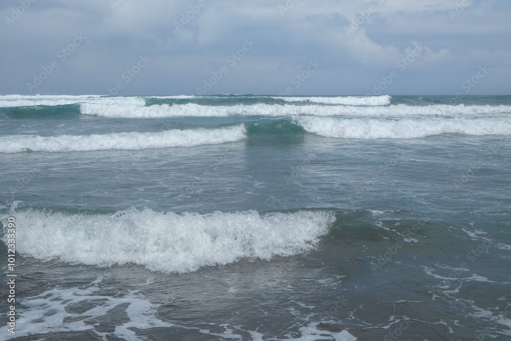Abstract shapes, patterns and textures of sea waves. Big waves heading towards the beach.For graphic design or banner background Abstract shapes, patterns and textures of sea waves. Big waves heading towards the beach.For graphic design or banner background