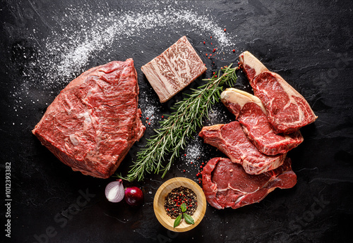 Fotografia An enticing assortment of fresh, highquality meats paired with aromatic herbs an