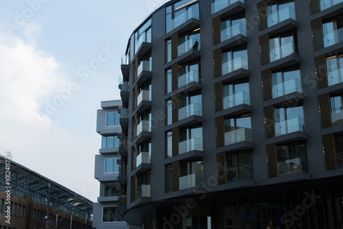 Layers of glass walls in Tjuvholmen under soft dusk lights - 1 photo