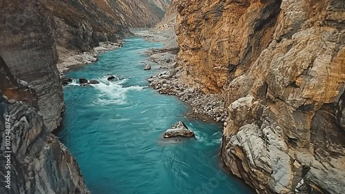 Wallpaper Mural A turquoise river flows through a narrow canyon with steep, colorful rock walls. Torontodigital.ca