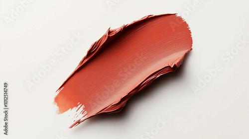 a single, elegant swatch of dusty orange lipstick on white background, with soft color gradients and subtle sheen to highlight the texture and glossiness of lip makeup