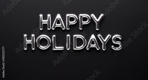 happy holidays silver shining shiny solid metallic lettering on plain black background