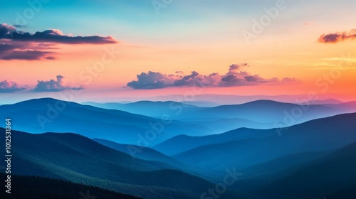 Mountain Range Silhouetted Against a Vibrant Sunset Sky