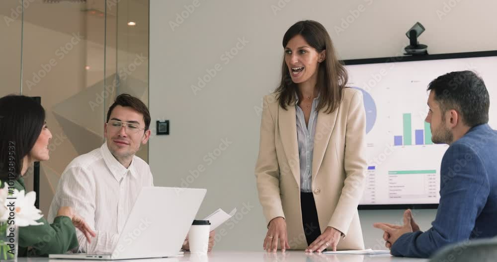 Business woman lead corporate meeting, make speech, provide explanations about new project or goals, share sales revenue, marketing strategy met in company office. Briefing, negotiation, seminar event