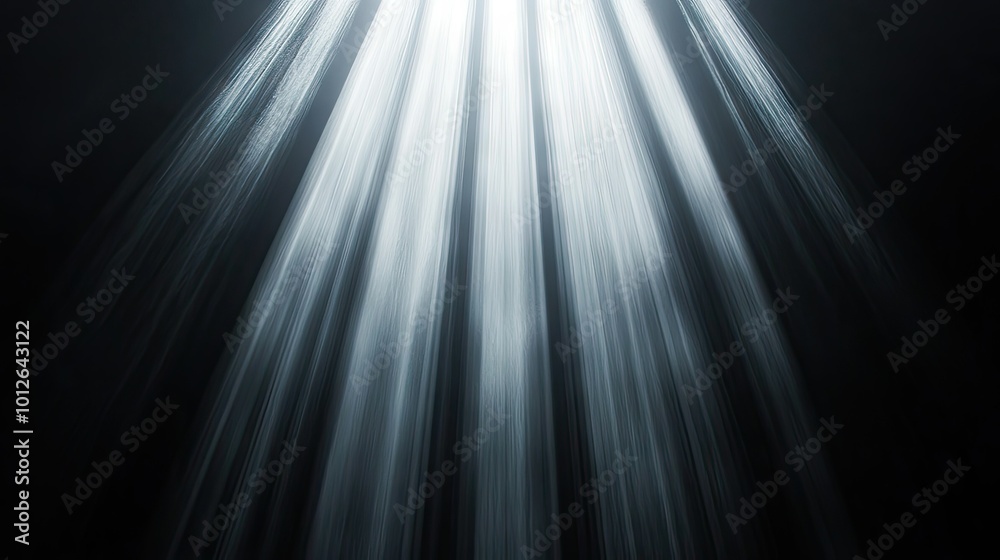 Glowing vertical shafts of light radiating from the top, casting soft illumination against a deep black background with subtle light refractions. Glowing vertical shafts of light radiating from the top, casting soft illumination against a deep black background with subtle light refractions.