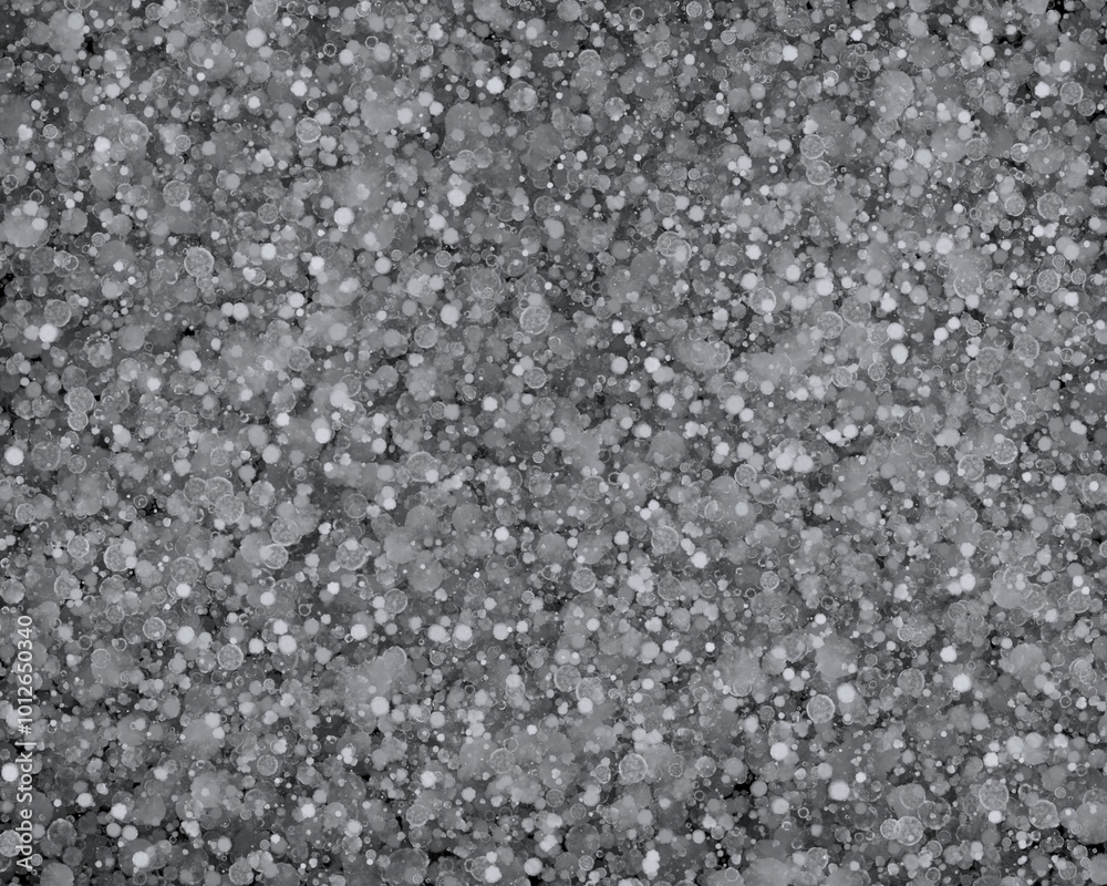 Abstract background with white and gray circles on a black background. Abstract background with white and gray circles on a black background.