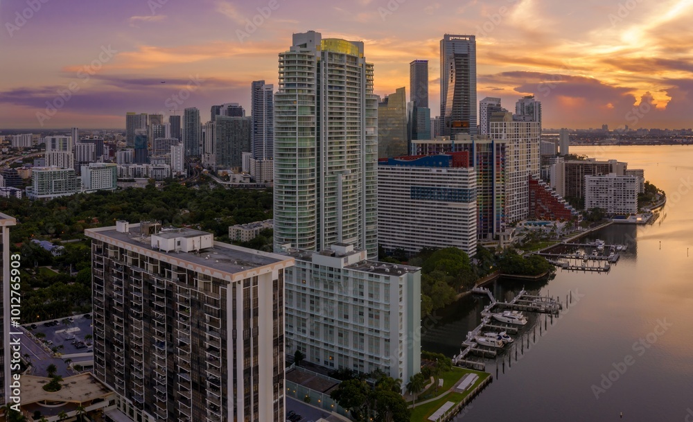 Fototapeta premium Downtown waterfront with buildings and condos at sunrise. Miami, Florida, United States.