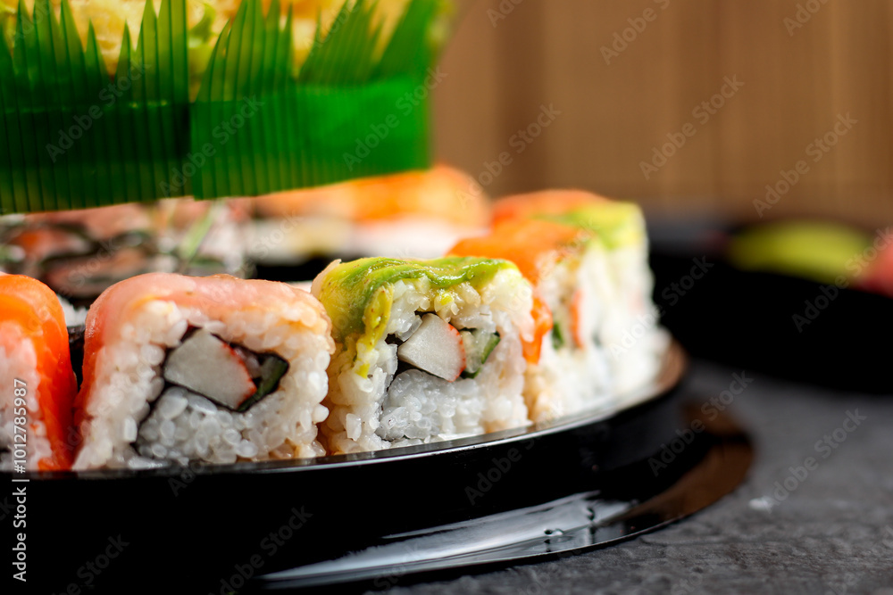 Sushi cake consists of uramaki sushi and norimaki sushi. Perfect for recipe, article, catalogue, or any commercial purposes. Sushi cake consists of uramaki sushi and norimaki sushi. Perfect for recipe, article, catalogue, or any commercial purposes.