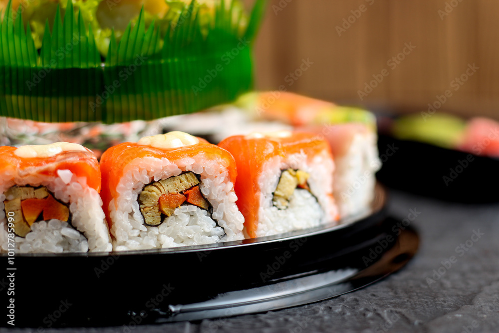 Sushi cake consists of uramaki sushi and norimaki sushi. Perfect for recipe, article, catalogue, or any commercial purposes. Sushi cake consists of uramaki sushi and norimaki sushi. Perfect for recipe, article, catalogue, or any commercial purposes.
