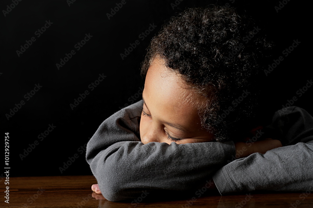Fototapeta premium boy in poverty being bullied at school with depression no help crying alone and all by himself on grey background with people stock photo stock image
