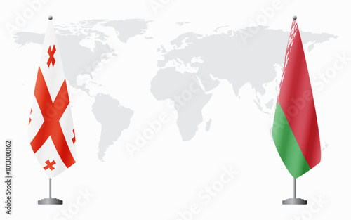 Georgia and Belarusian flags for official meeting against background of world map.
