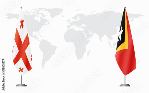 Georgia and Timor-Leste flags for official meeting against background of world map.