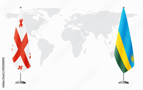Georgia and Rwanda flags for official meeting against background of world map.
