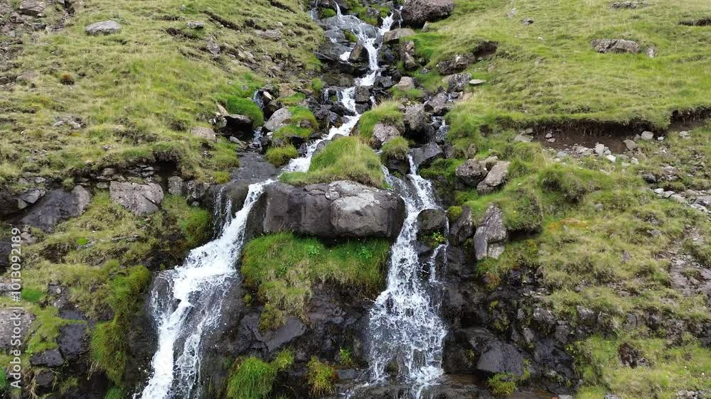 Mountain waterfall. Mountain river. A huge waterfall. Mountain waterfall. Mountain river. A huge waterfall.