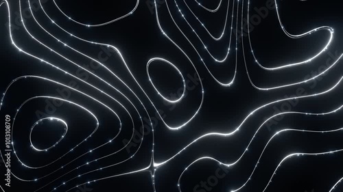 Abstract silver glowing lines with glitter effect on dark background, forming smooth wavy patterns.
