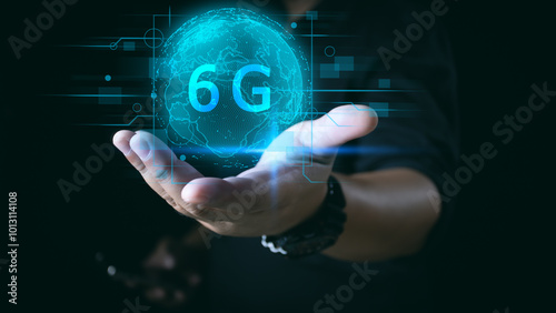 Businessman holding global network connection on 6G technology and futuristic advancement, uture technology 6G network internet of thinks connection communication, high-speed internet network signal. photo