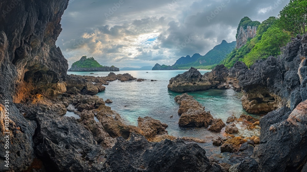 A captivating view of the limestone karsts rising from the sea at Koh Tarutao, creating a dramatic backdrop for visitors. A captivating view of the limestone karsts rising from the sea at Koh Tarutao, creating a dramatic backdrop for visitors.