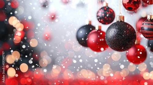 A festive display of red and black Christmas ball ornaments glows with shimmering lights, surrounded by gently falling snow and a bokeh background, leaving plenty of copy space for seasonal greetings