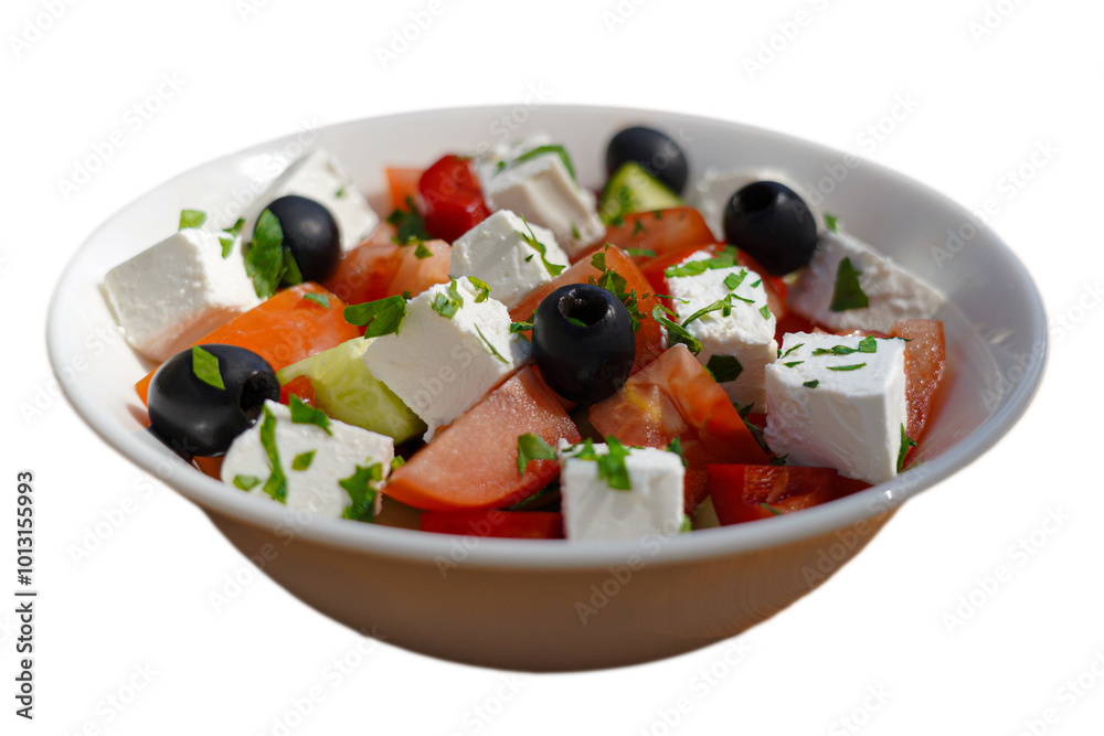 Close-up of a Greek salad - cheese, black olives, tomatoes and cucumber. Perfect for healthy menus, this close-up image emphasizes the crisp vegetables and feta cheese